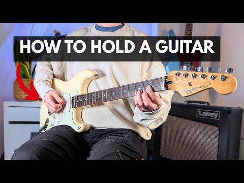 How to Hold a Guitar (Sitting and Standing) | Easy Beginner Guide