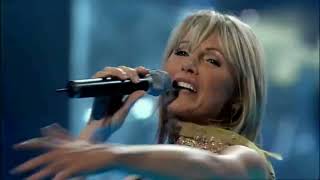 Kadr z teledysku Eurosong medley: Eres Tu, Aprés Toi, Ein bisschen Frieden tekst piosenki Dana Winner