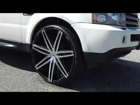 White Range Rovers on 26" Lexani Wheels at Stuntma