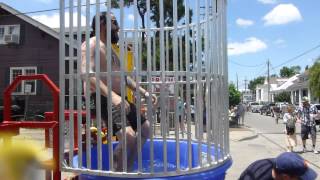 Billy Iuso get dunked in the dunking booth at the oak street block party 04-29-2015