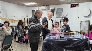 הבדלה במקלט בית-הכנסת "אחוה ורעות" (צילמה שושי בלבין)