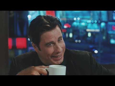 Old Dogs (2009) trailer frame — Robin Williams and John Travolta in a kid-chaos whirlwind