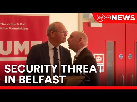 Simon Coveney removed from stage after security threat in Belfast