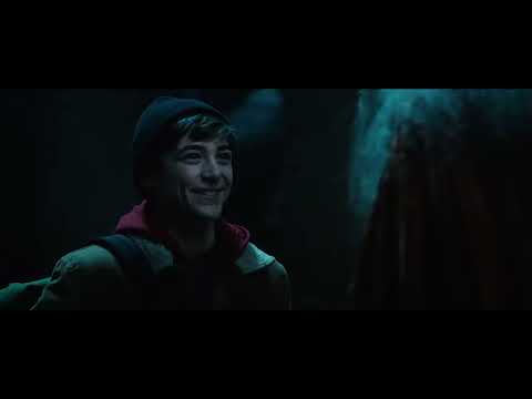 Shazam! 2019 official teaser trailer key art still showing the hero texting and chewing bubblegum