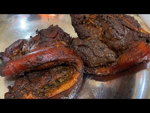 Authentic Jamaican Jerk Pork, slowly cook over pimento wood