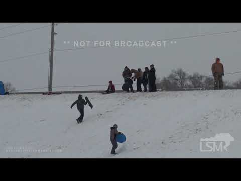 02-02-2022 Andover, KS - Tons of kids sledding/snowboarding