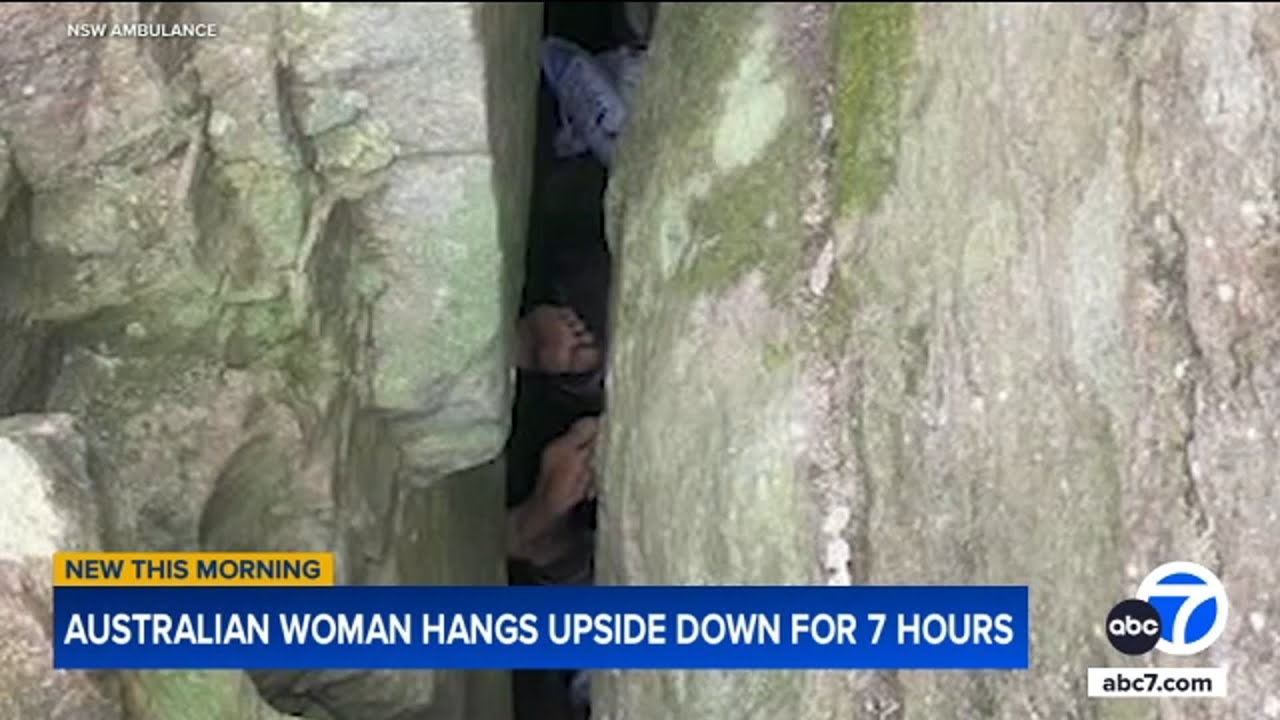 Woman stuck upside down between rocks for 7 hours after trying to retrieve her phone