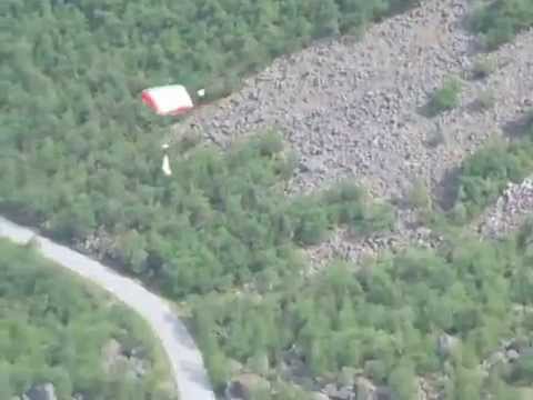Base jumper at Trollväggen in Norway