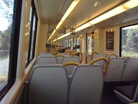 Grain train in Corinda Brisbane, and trip to Bundamba by suburban train. John Coyle video