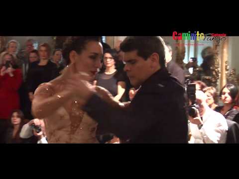  Alejandra Hobert  and  Adrian Veredice  are  dancing  to  the  vals  "  Valsecito Amigo  "  by  Aníbal Troilo  at  Catania Tango Festival  in  2017