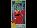 Sesame Songs Home Video Elmo S Sing Along Guessing Game
