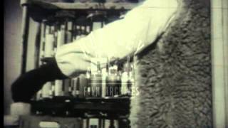 Blood transfusions in Algeria in the late 1940's.  Film 36750