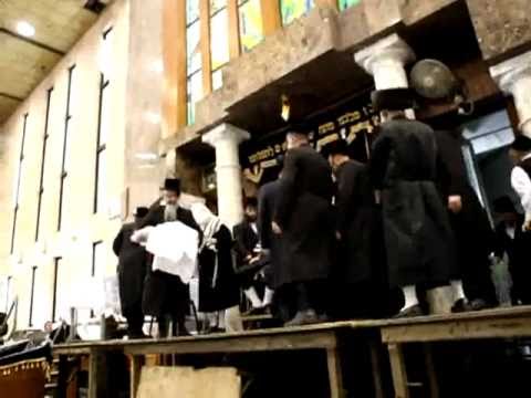 Hgh"k Viznitzer Rebbe Shlita Sandik at a Bris of Grandson