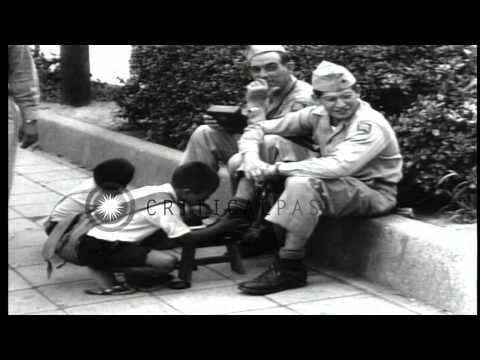 US soldiers along streets in Japan during American occupation after World War II. HD Stock Footage