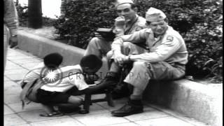 US soldiers along streets in Japan during American occupation after World War II. HD Stock Footage