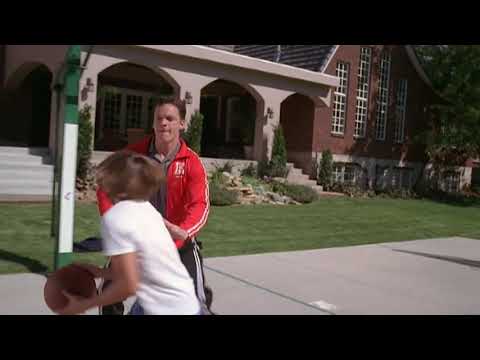 High School Musical 2006 original trailer still of the Wildcats in the East High gym