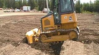 preview picture of video 'Central Training Academy, Sloping 650 John Deere Dozer'