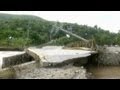 Storm-ravaged Acapulco battles looters and alligators
