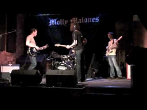 Dan and Leland play "Just One" and "Voltage" live at Molly's