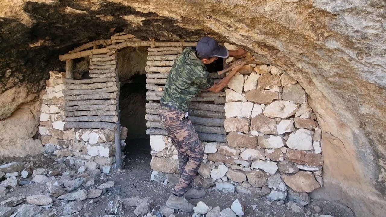 I turned an amazing old stone cave into a safe haven with a fireplace