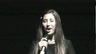 "Put a Little Holiday in Your Heart" sung by Hannah Marks