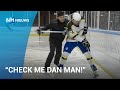 IJshockeybaas Ron Berteling laat zien hoe je moet bodychecken