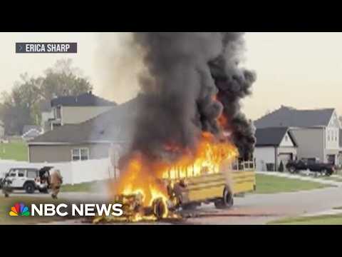 Children escape just before bus erupts in flames