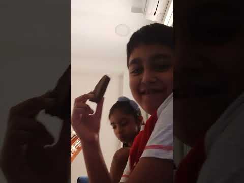 Trying Cadbury chocolate cake with sriya