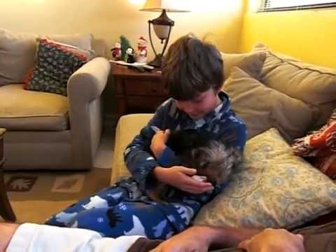 The sweetest boy gets dog for christmas EVER!