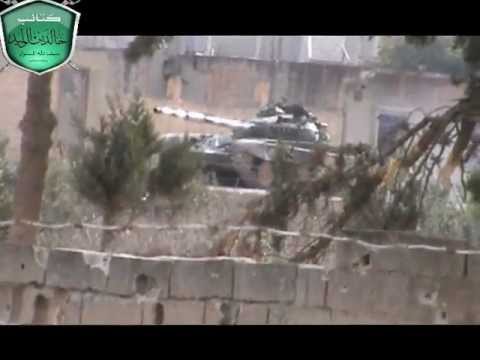 استهداف دبابة T72 بقذيفة آر بي جي من قبل لواء خالد بن الوليد في مدينة القصير في حمص