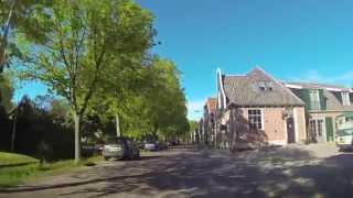 preview picture of video 'De Dorpsstraat in Nieuwe Niedorp gefilmd op de eerste echte zomerdag van 2013 pas op 27 Mei'