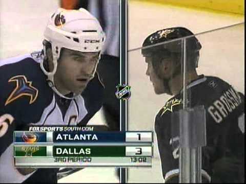 Niklas Grossman hits Andrew Ladd