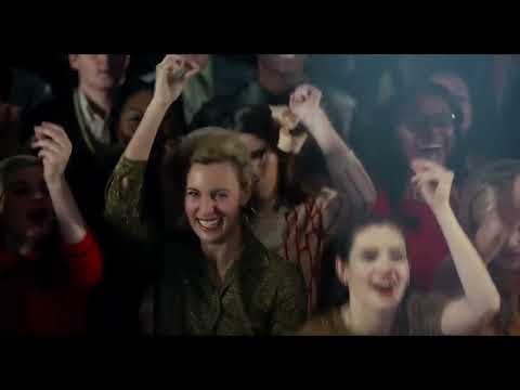 Get On Up official trailer still with Chadwick Boseman as James Brown in performance stance