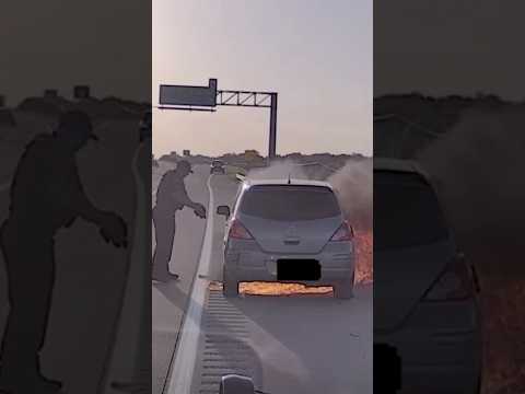Police officer rescues man from burning car on Texas highway
