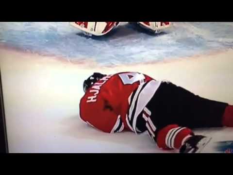 Niklas Hjalmarsson puck to throat in Stanley Cup Playoffs,
