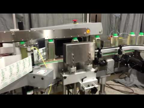 Front Back Labeler, Accumulating Rotary Table Model RA 3200, containers bottle 16oz