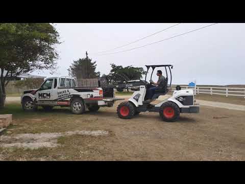 CL50 Multi Loader lifts a Pallet of Bricks - CL-Range Articulating Loaders
