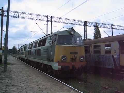 Poland: PKP Passenger trains at Pila Glowna station pulled by ST43, SU45 and ET22 locomotives