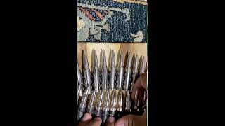 How to push in bullet belts (www.PunkCulture.co.uk)