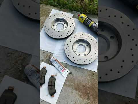 Plaquettes de frein avant BREMBO + Disques perforés Brembo Xtra