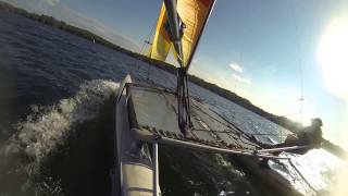 preview picture of video 'Sailing a Hobie 16 catamaran while hiked out on the trapeze and going fast!!!'