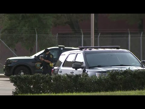 Woman killed after driver runs into post office