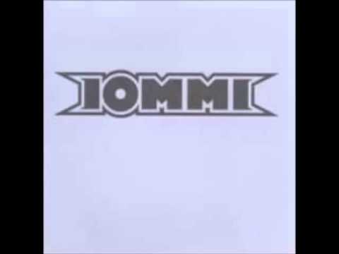 iommi- laughin man (in the devil mask)