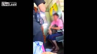 Sketchy Thai Buddhist Monk Slaps Unruly Train Passenger