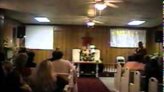 Bishop Tim Hill preaching at a country church