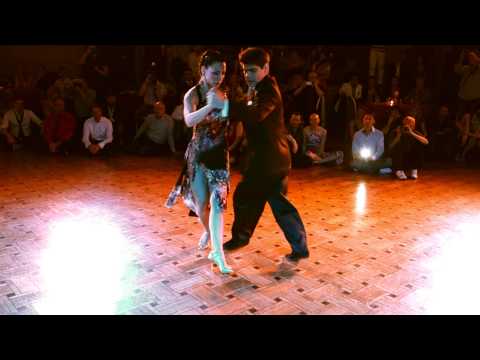  Alejandra Hobert  and  Adrian Veredice  are  dancing  to  the  tango  "  Recuerdo  "  by  Osvaldo Pugliese  at  Brussels Tango Festival  in  2014