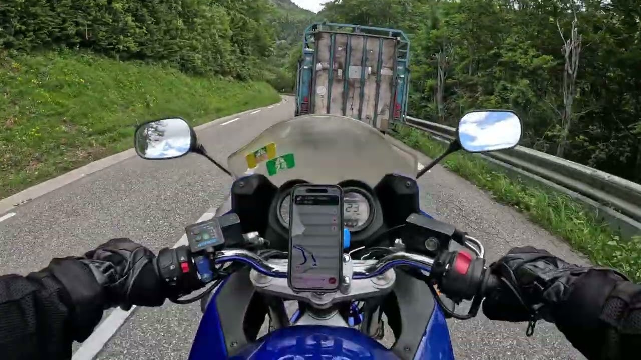 Motorcycle POV riding in Jura mountains