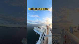 Sailing away from port at sunset on the beautiful Celebrity Apex in the Caribbean