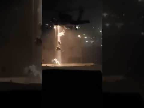 Israeli soldiers rappel from helicopter in occupied West Bank