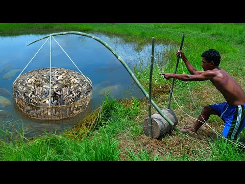 Primitive technology - Making Trap To Catch Catfish using Bamboo to lure fish Trap Work 100%